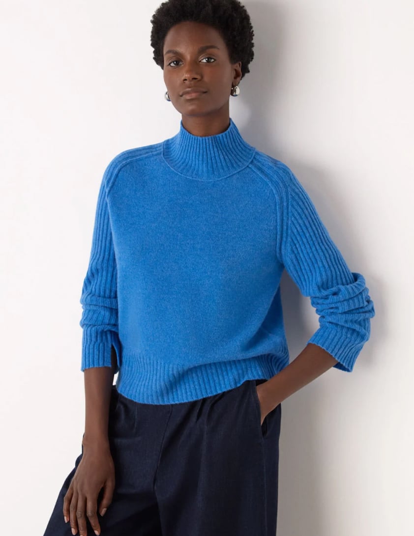 woman wearing shearling leather jacket with jeans